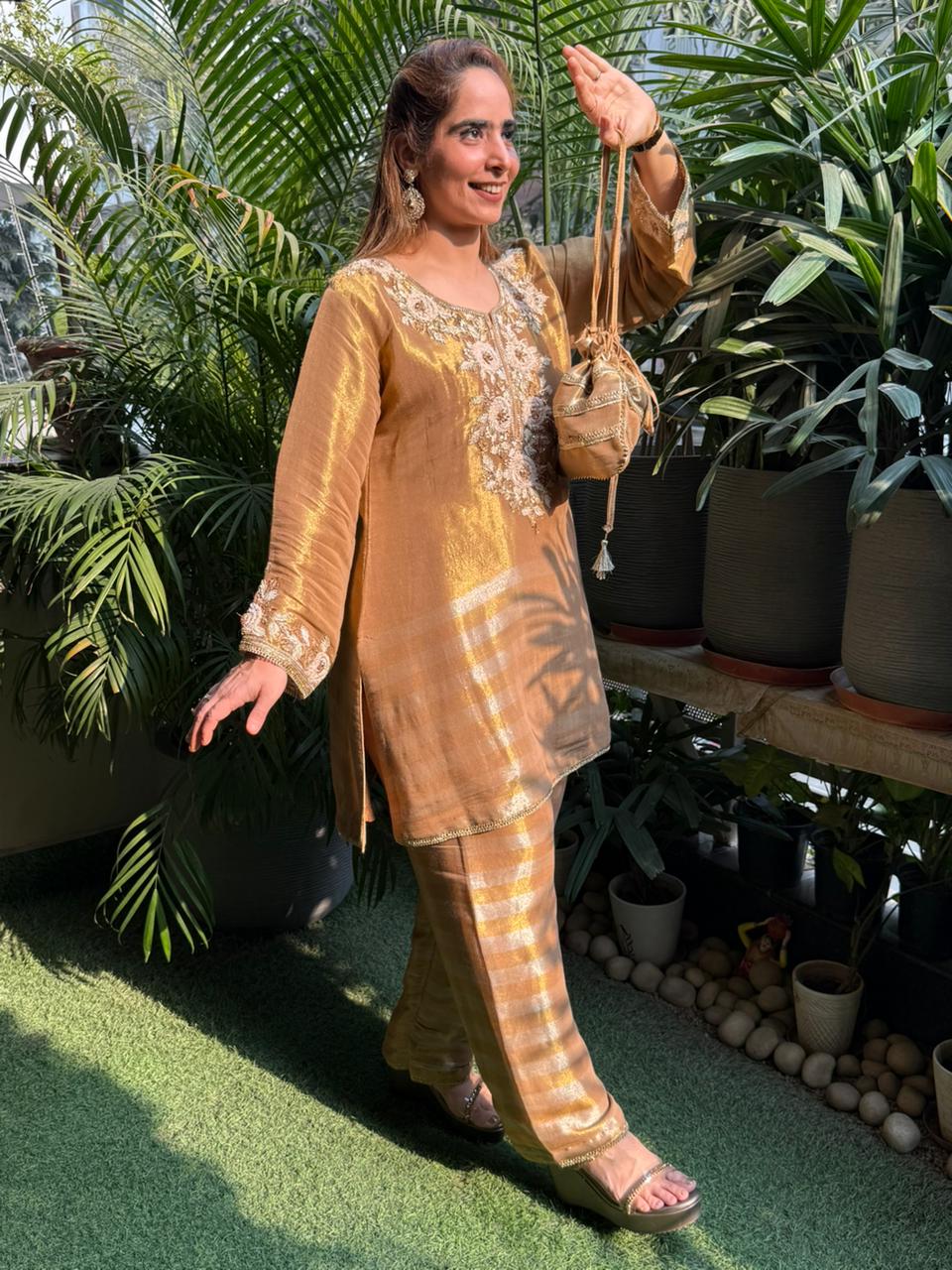 Elegant cord set crafted in luxurious tissue silk fabric