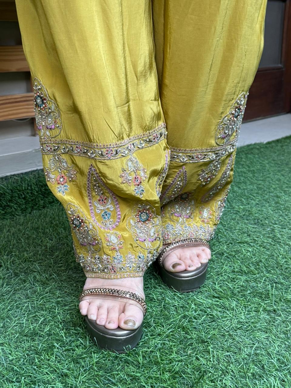 Luxurious three-piece kurta set is designed to make you stand out with timeless elegance