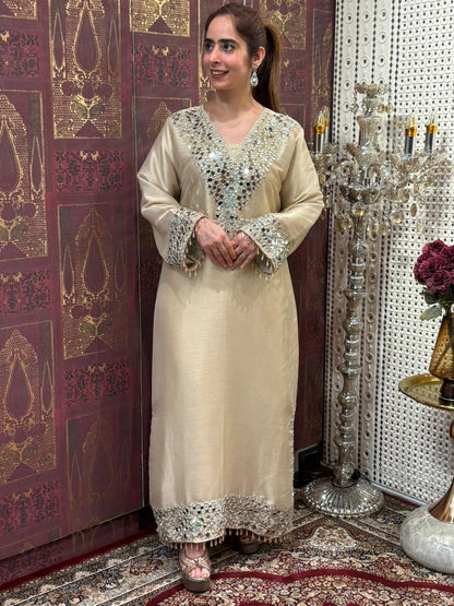 Elegant long kurta set is crafted in luxurious tissue silk fabric