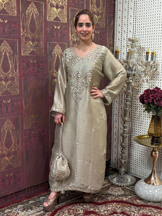 Elegant Pheran-style kurta set is made in luxurious tissue silk