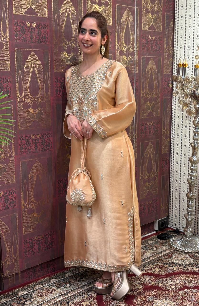 Elegant Pheran-style kurta set is made in luxurious tissue silk