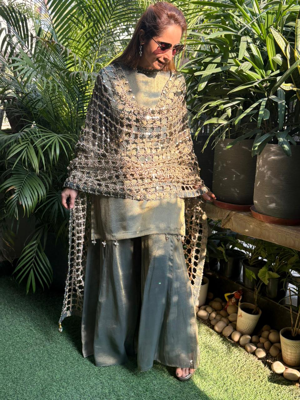 Grace meets effortless glamour in this beautifully crafted kurta set