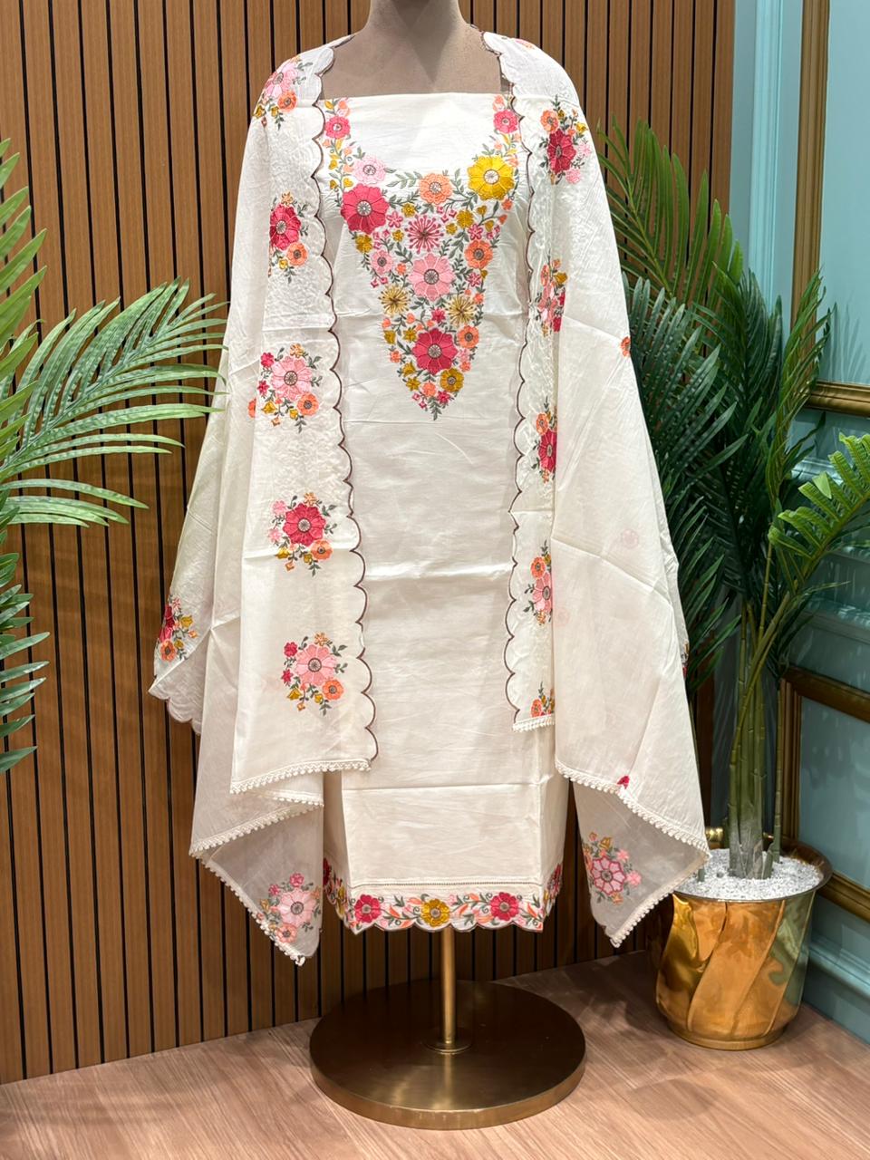 Elegant unstitched suit set is crafted in soft cotton fabric