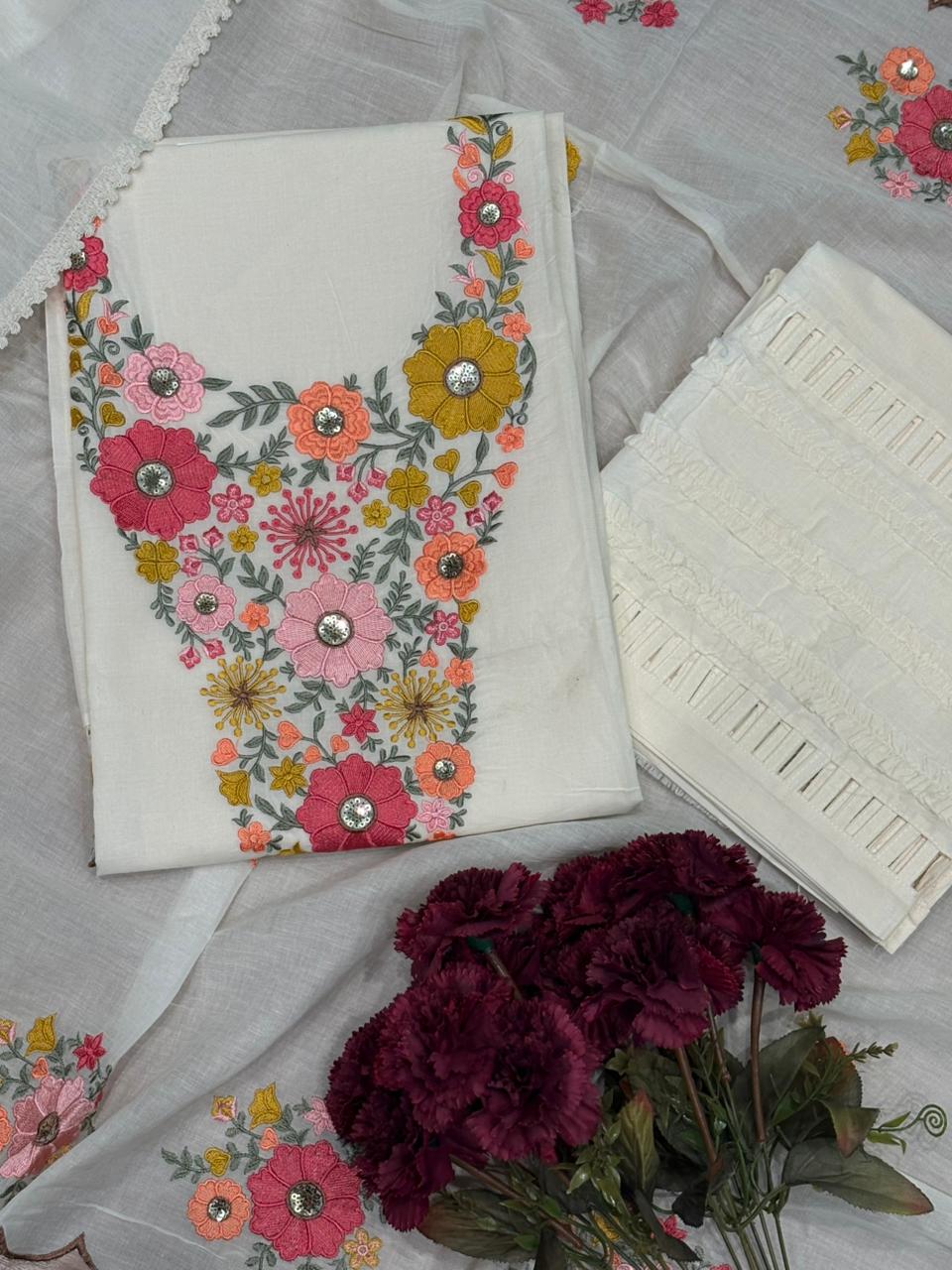 Elegant unstitched suit set is crafted in soft cotton fabric