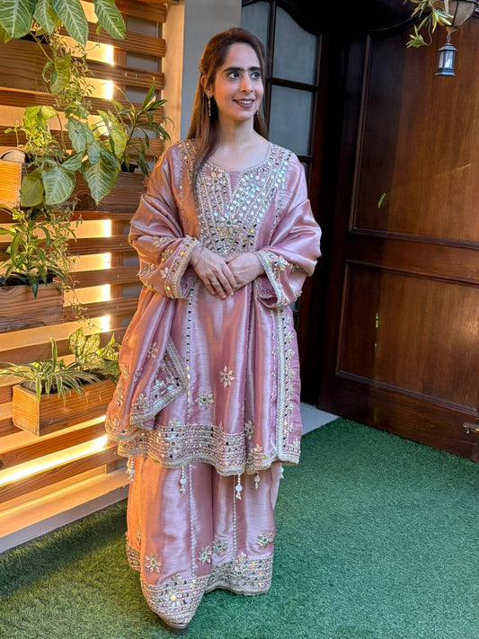 Exquisite Anarkali set is crafted in luxurious tissue silk fabric