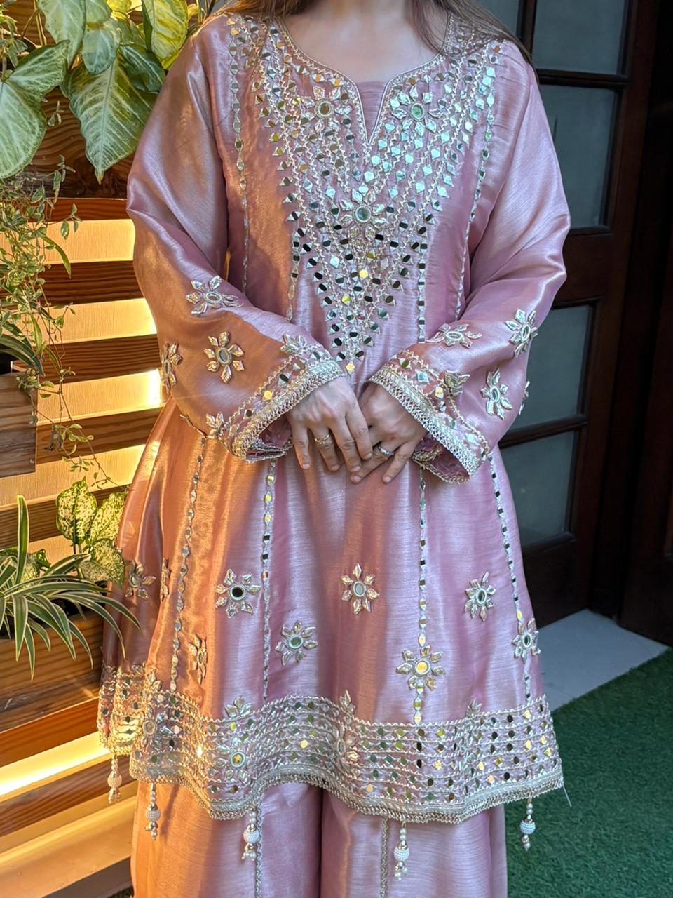 Exquisite Anarkali set is crafted in luxurious tissue silk fabric