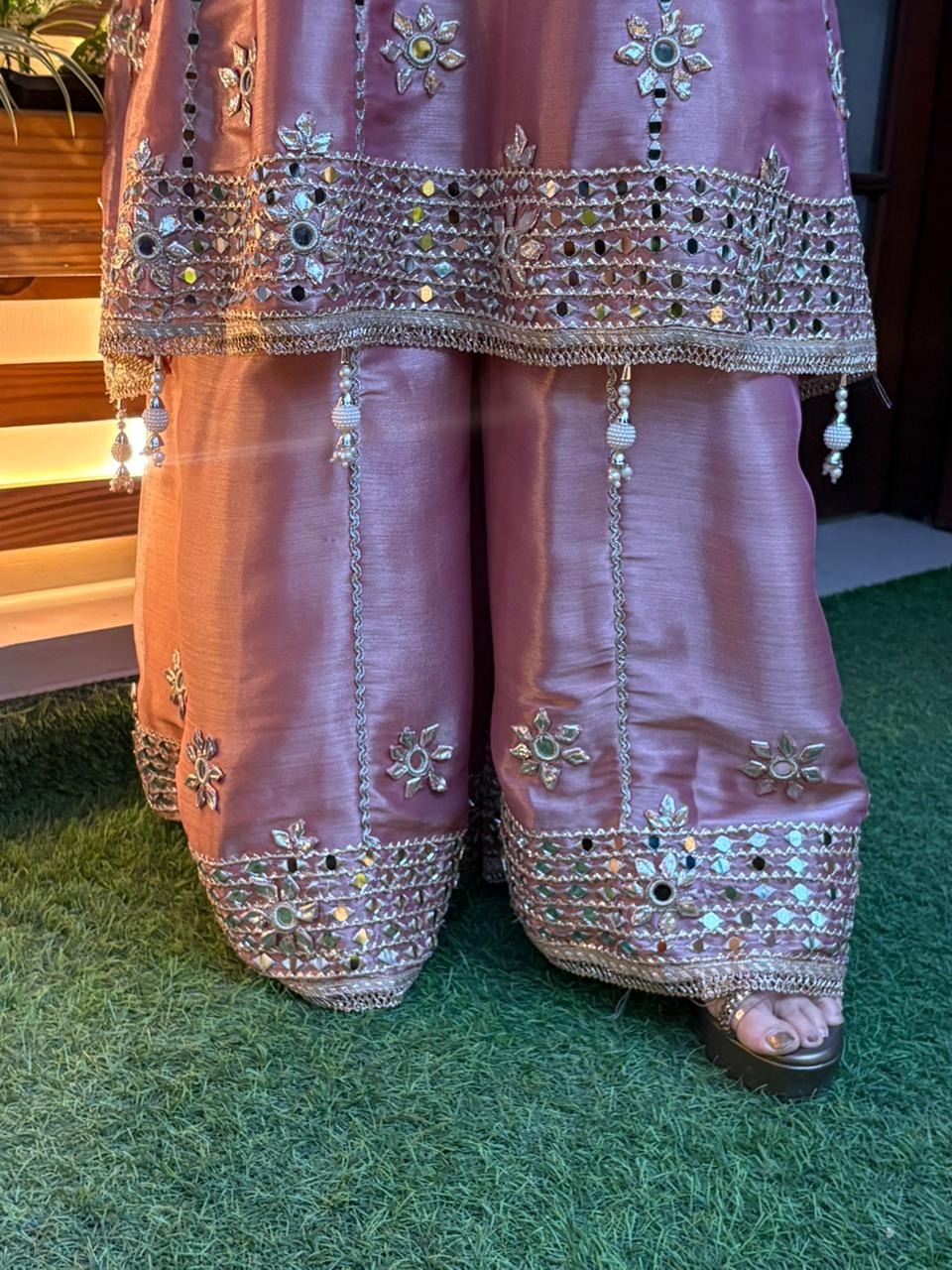 Exquisite Anarkali set is crafted in luxurious tissue silk fabric