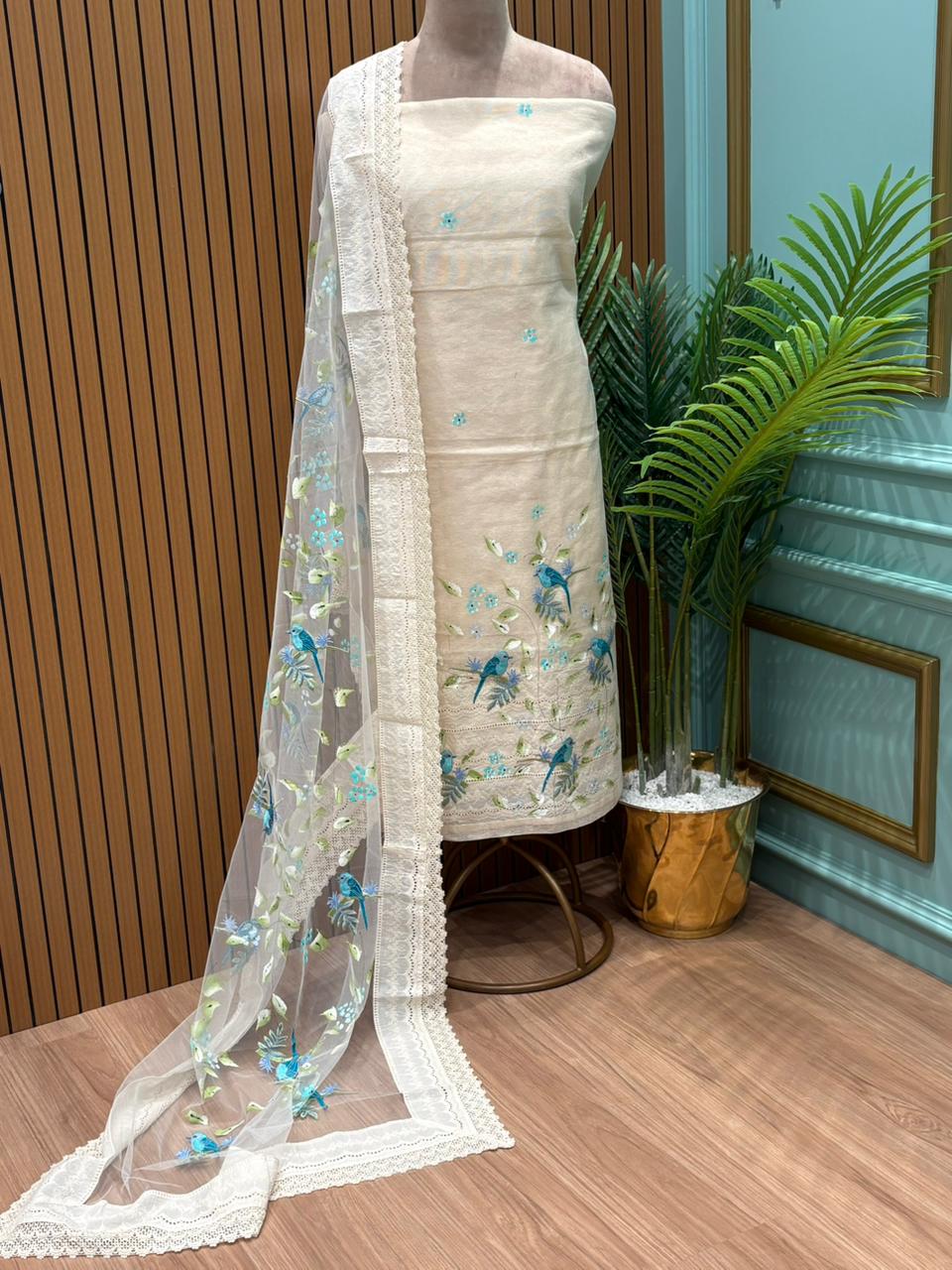 Graceful unstitched suit set is crafted in soft Kota cotton fabric