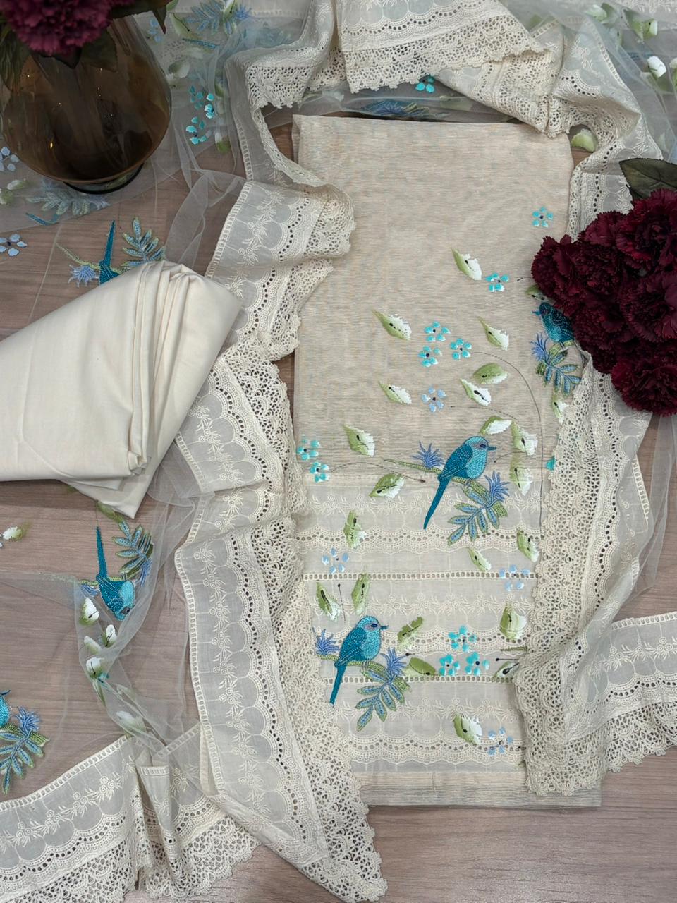 Graceful unstitched suit set is crafted in soft Kota cotton fabric