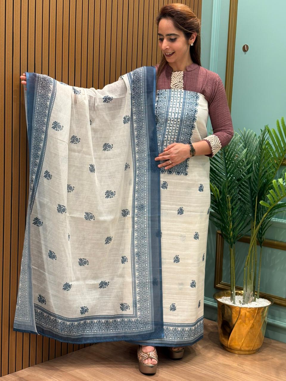 Sophisticated unstitched suit fabric is crafted in a premium linen-cotton blend