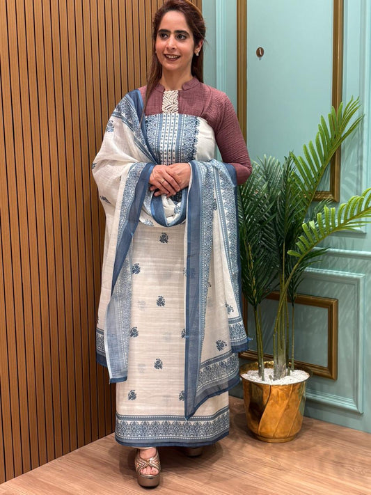 Sophisticated unstitched suit fabric is crafted in a premium linen-cotton blend