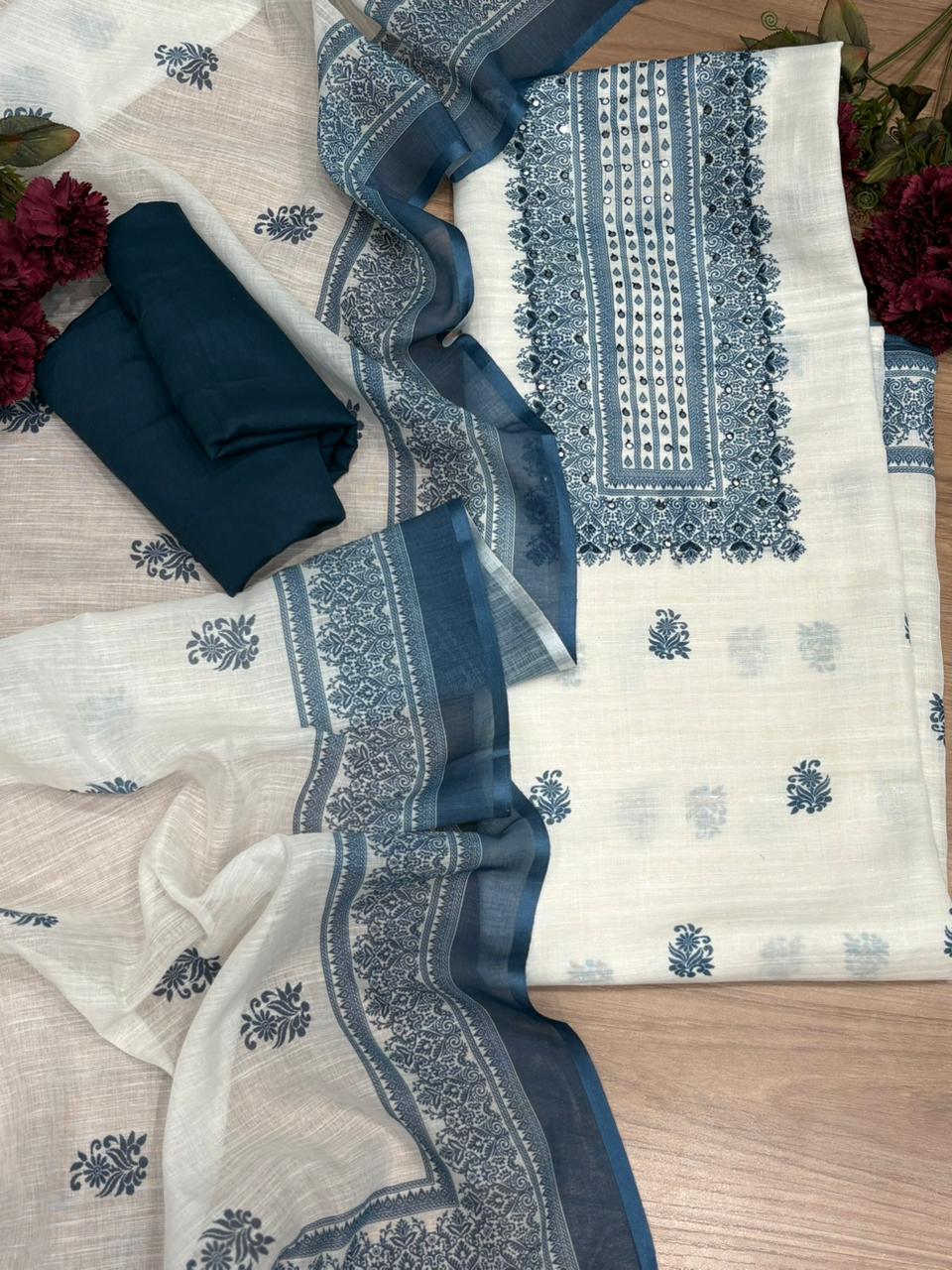 Sophisticated unstitched suit fabric is crafted in a premium linen-cotton blend