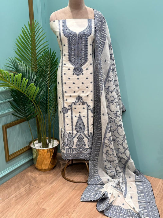 Elegant unstitched suit set is crafted in premium cotton fabric