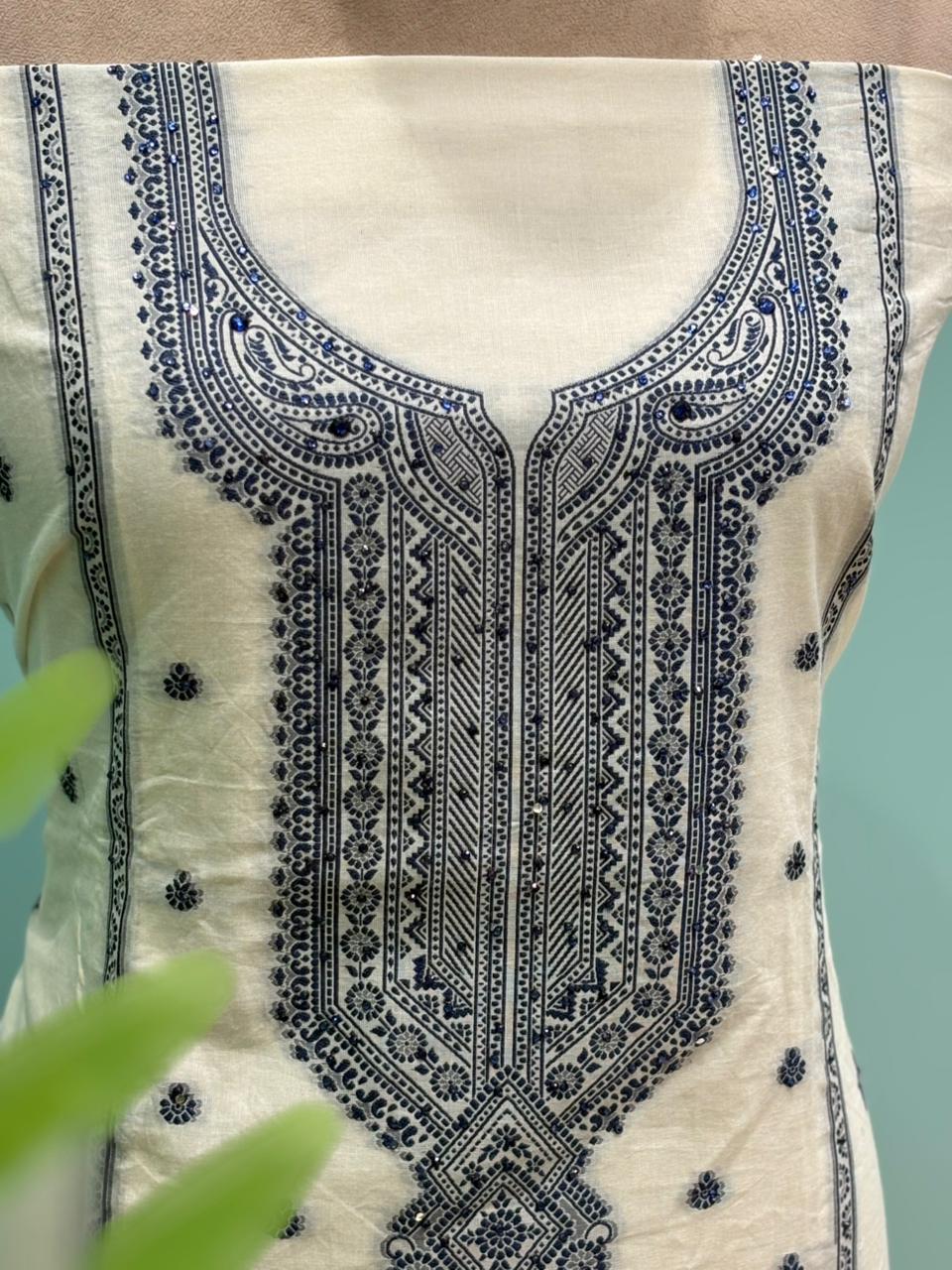 Elegant unstitched suit set is crafted in premium cotton fabric