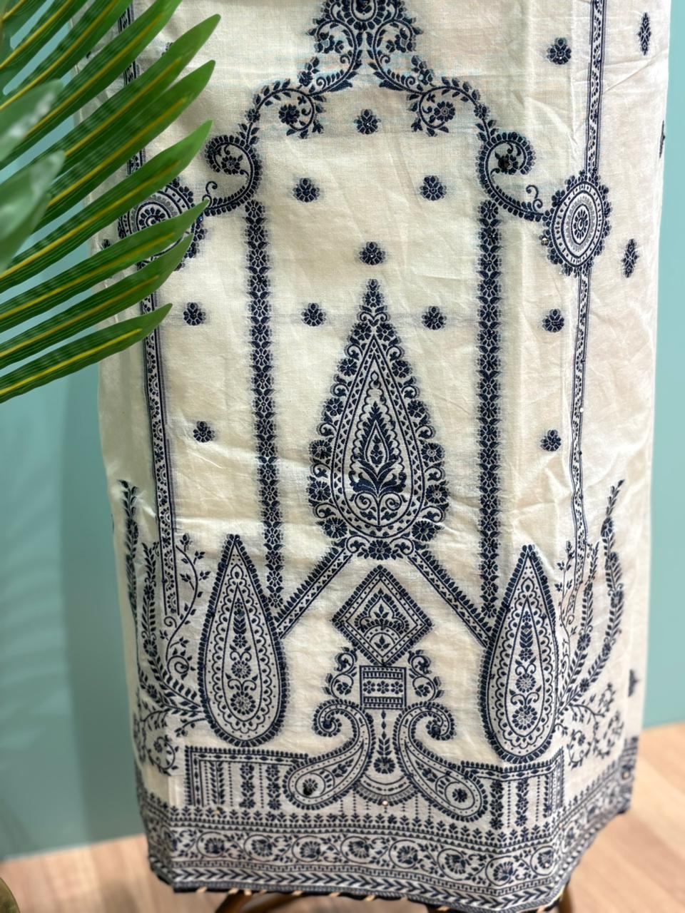 Elegant unstitched suit set is crafted in premium cotton fabric