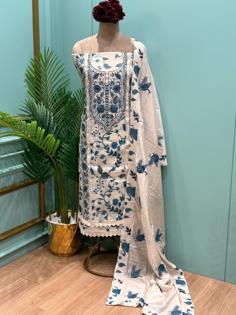 Graceful unstitched suit set is crafted in premium linen cotton fabric