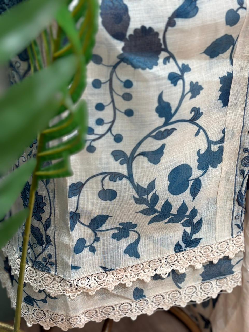 Graceful unstitched suit set is crafted in premium linen cotton fabric