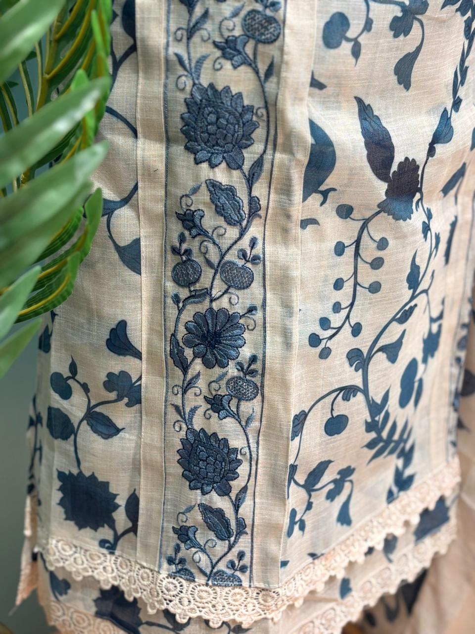 Graceful unstitched suit set is crafted in premium linen cotton fabric