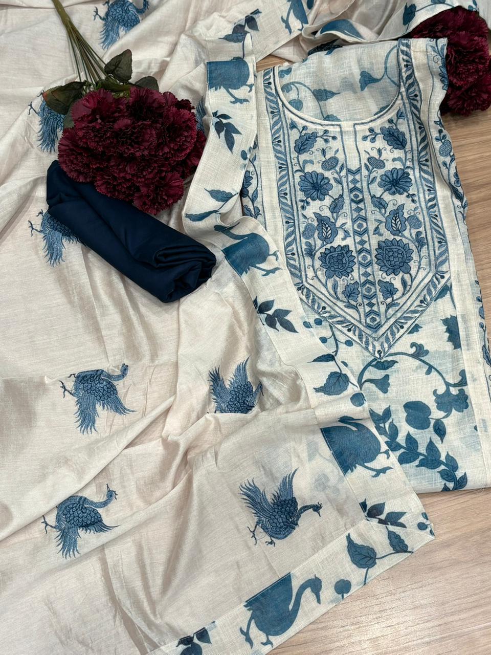 Graceful unstitched suit set is crafted in premium linen cotton fabric