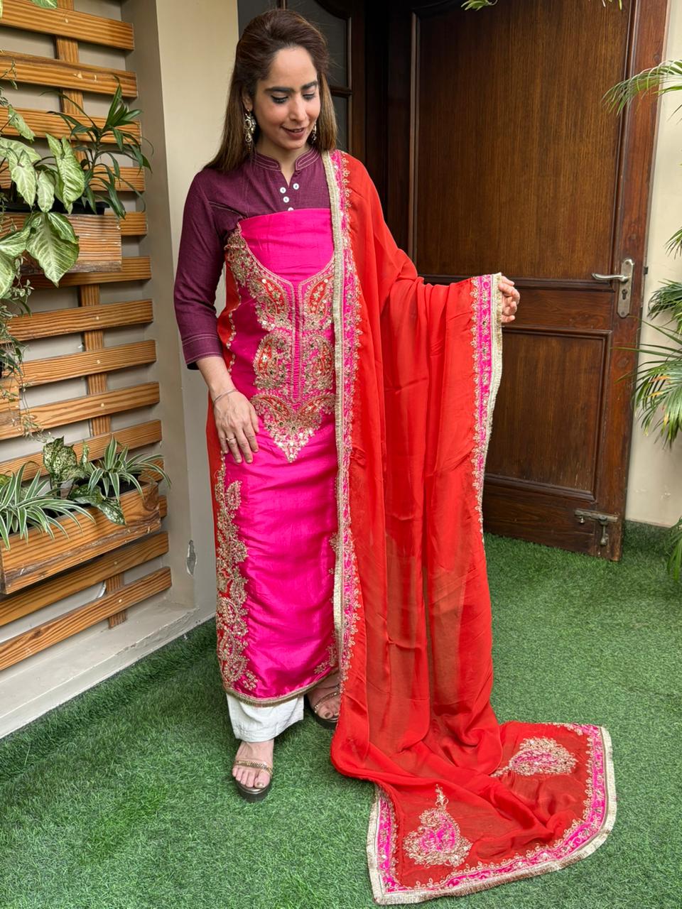 Elegant unstitched suit is crafted in rich silk fabric