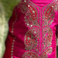 Elegant unstitched suit is crafted in rich silk fabric