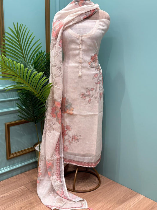 Elegant unstitched suit is crafted in breathable linen cotton fabric