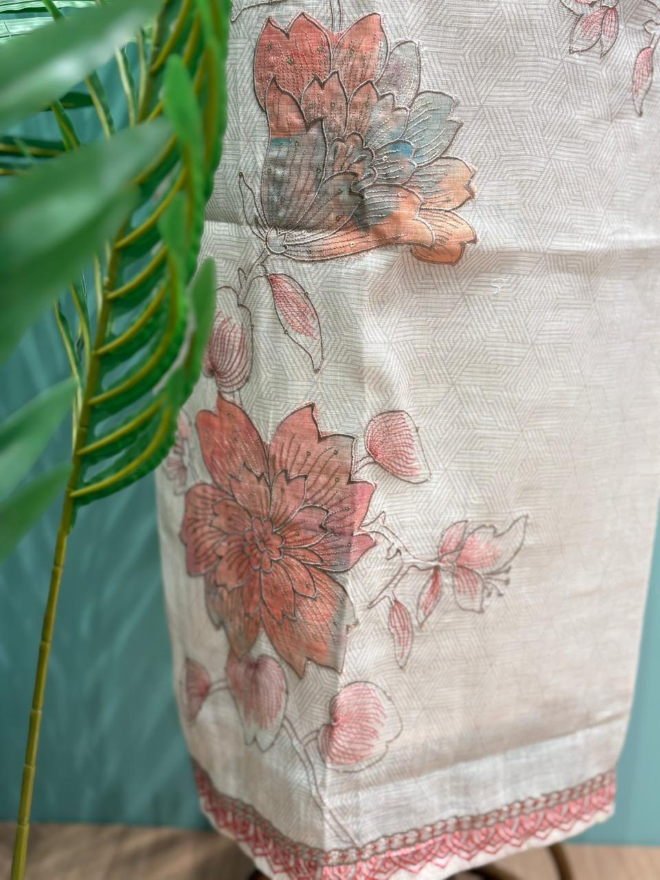 Elegant unstitched suit is crafted in breathable linen cotton fabric