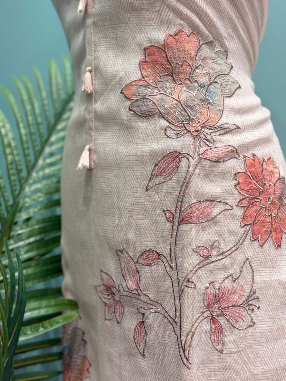 Elegant unstitched suit is crafted in breathable linen cotton fabric