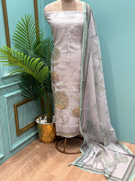 Elegant unstitched suit is crafted in breathable linen cotton fabric