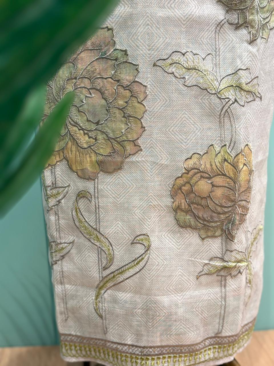 Elegant unstitched suit is crafted in breathable linen cotton fabric