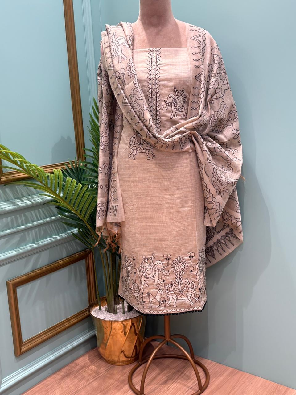 Graceful unstitched cotton suit reflects timeless elegance