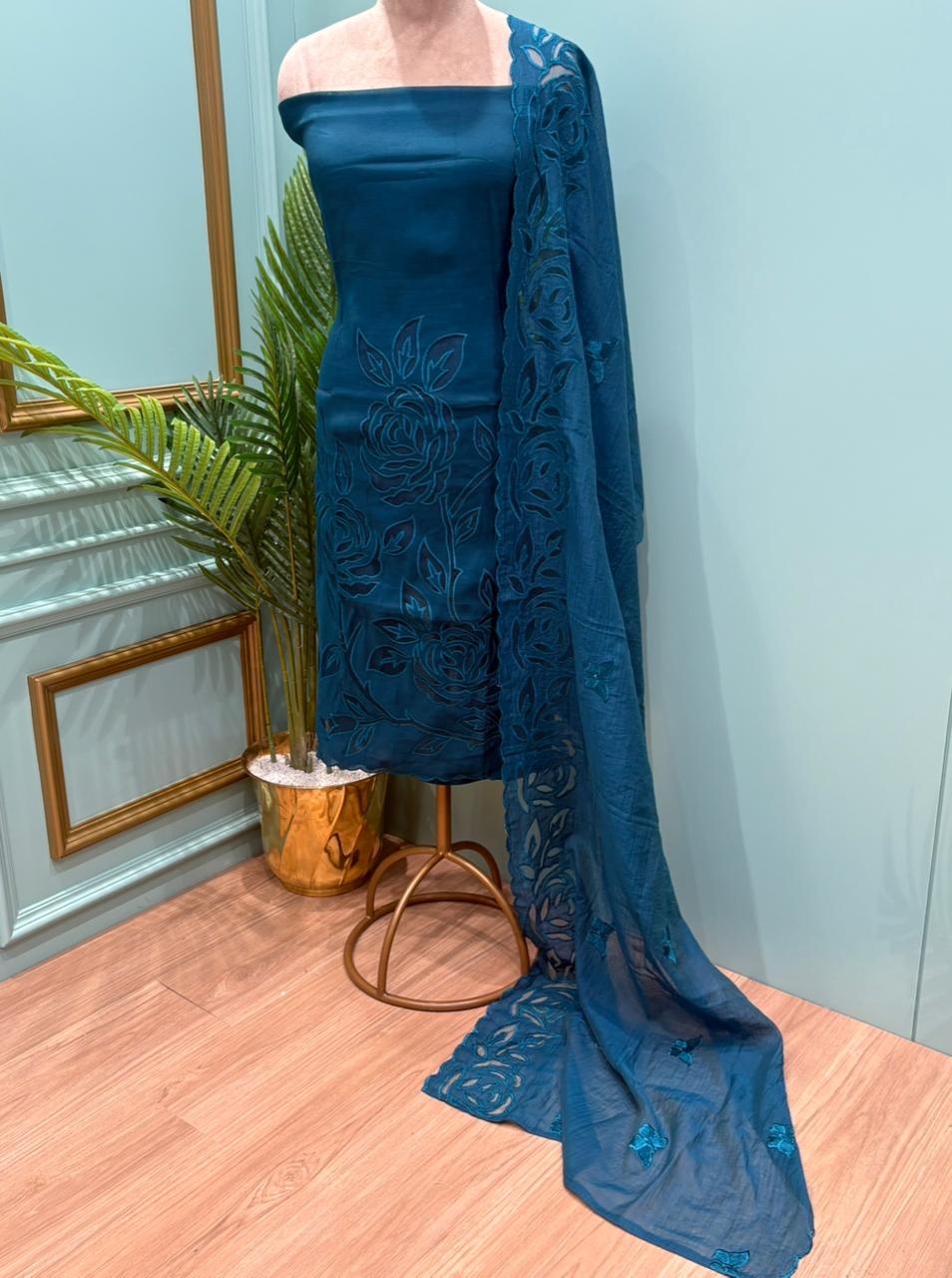 Elegant unstitched suit is crafted in premium muslin cotton