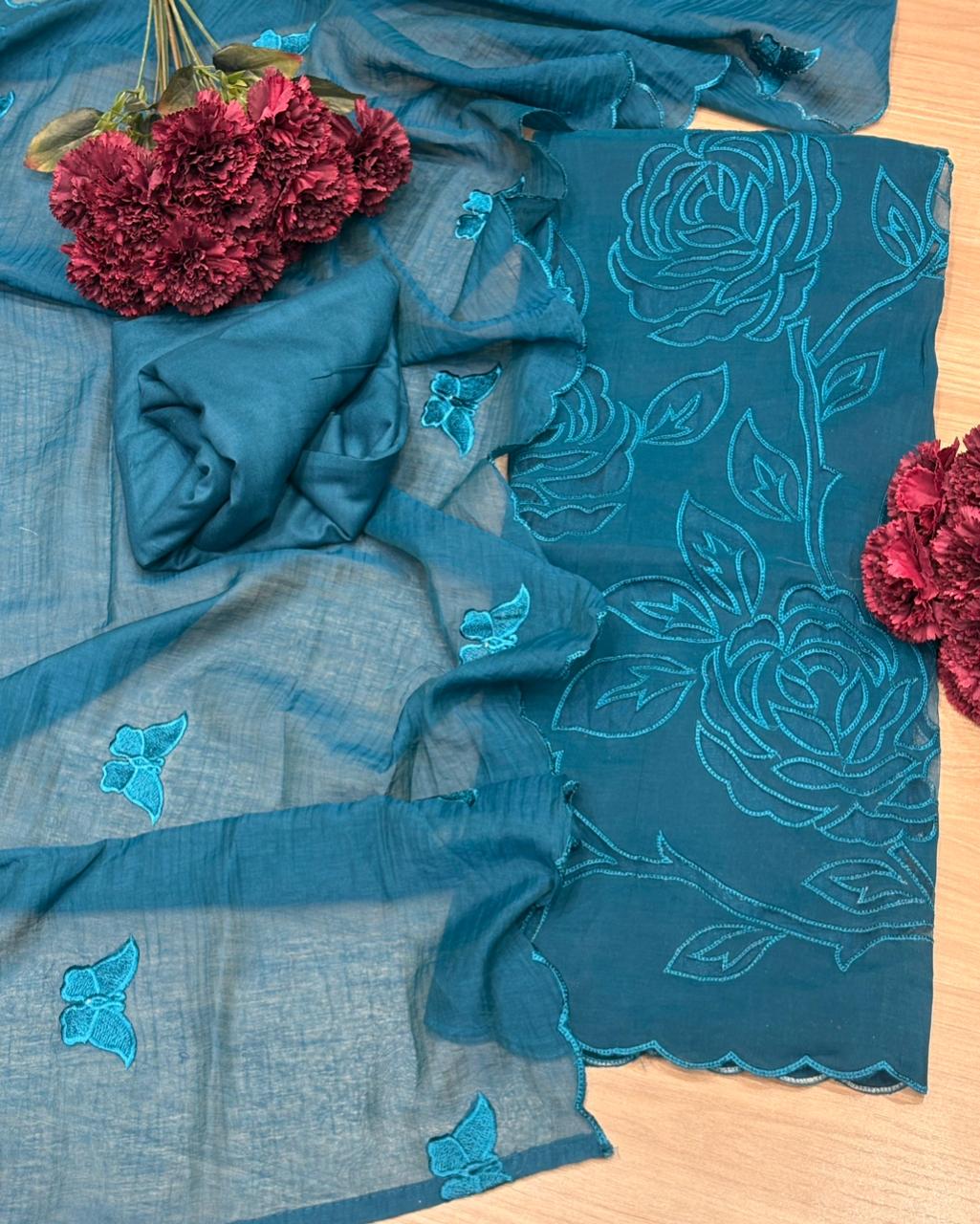 Elegant unstitched suit is crafted in premium muslin cotton