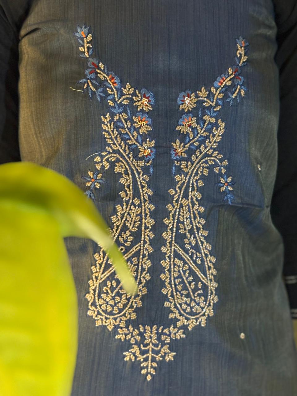 Experience timeless elegance with this unstitched suit