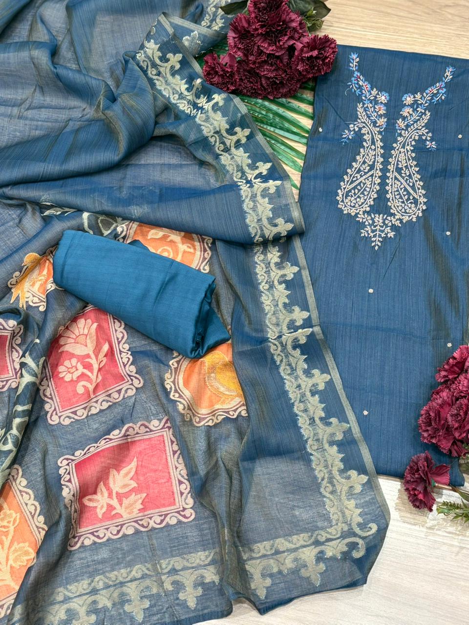 Experience timeless elegance with this unstitched suit