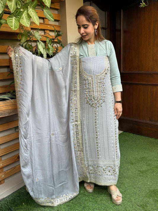 Elevate your ethnic wardrobe with this graceful unstitched suit
