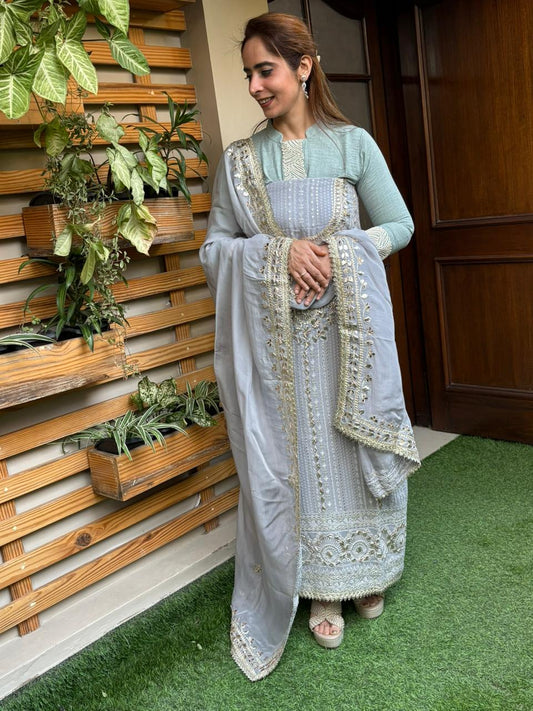 Elevate your ethnic wardrobe with this graceful unstitched suit