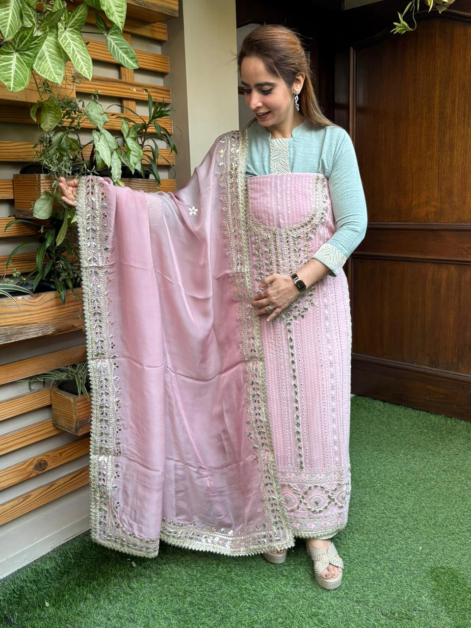 Elevate your ethnic wardrobe with this graceful unstitched suit