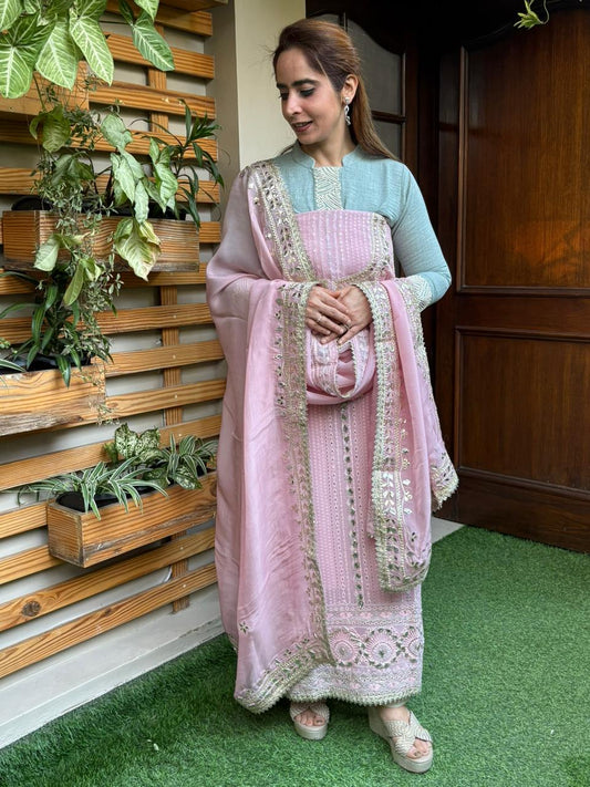 Elevate your ethnic wardrobe with this graceful unstitched suit