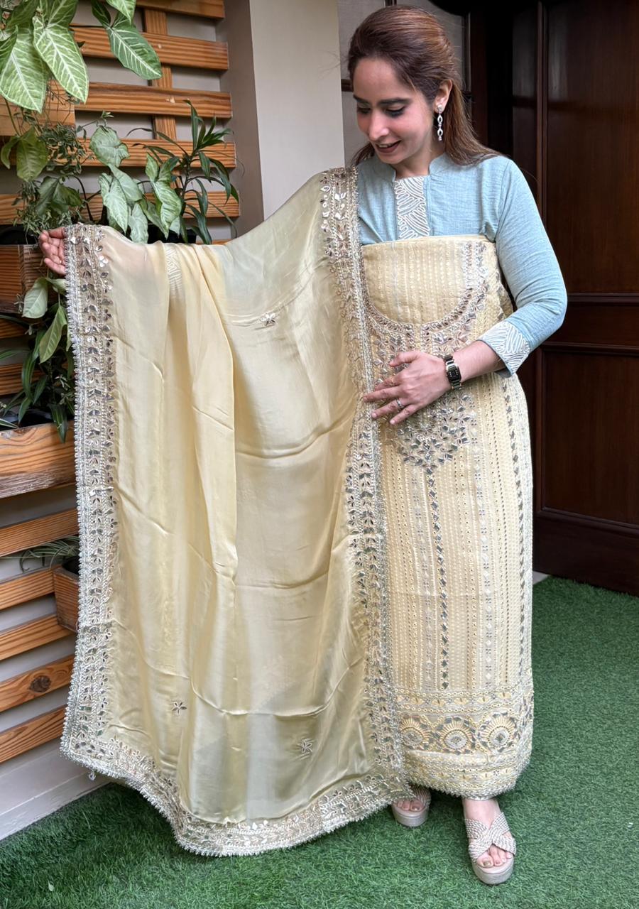 Elevate your ethnic wardrobe with this graceful unstitched suit