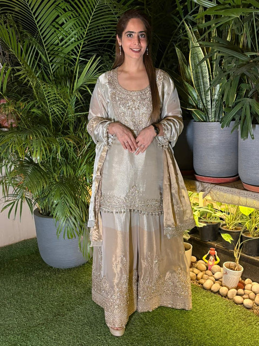 Exquisite kurta set crafted in pure tissue silk fabric