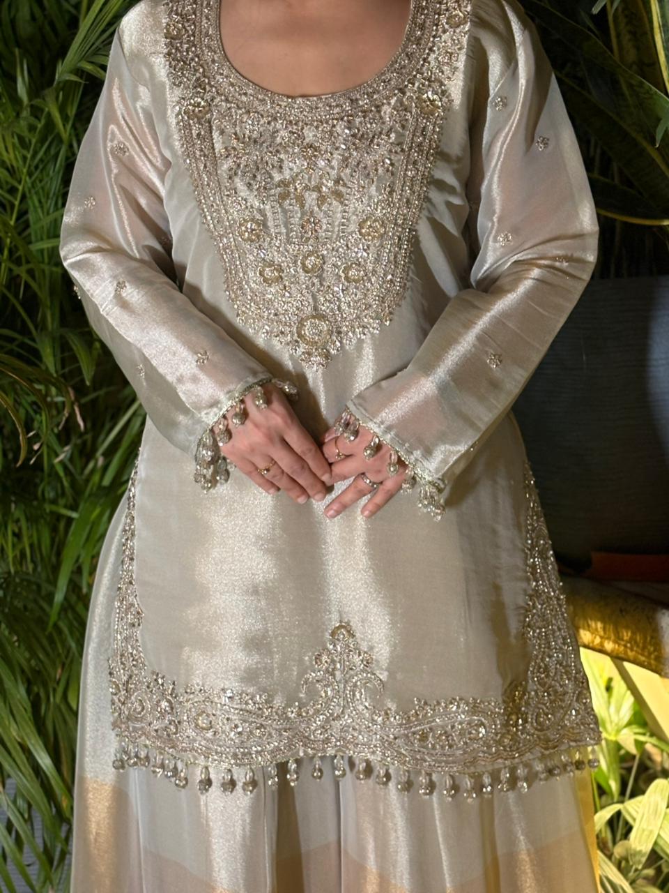 Exquisite kurta set crafted in pure tissue silk fabric