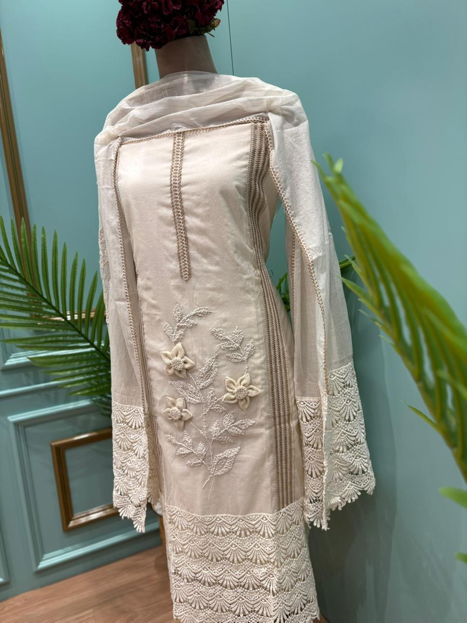 Graceful and timeless, this beautiful unstitched cotton suit