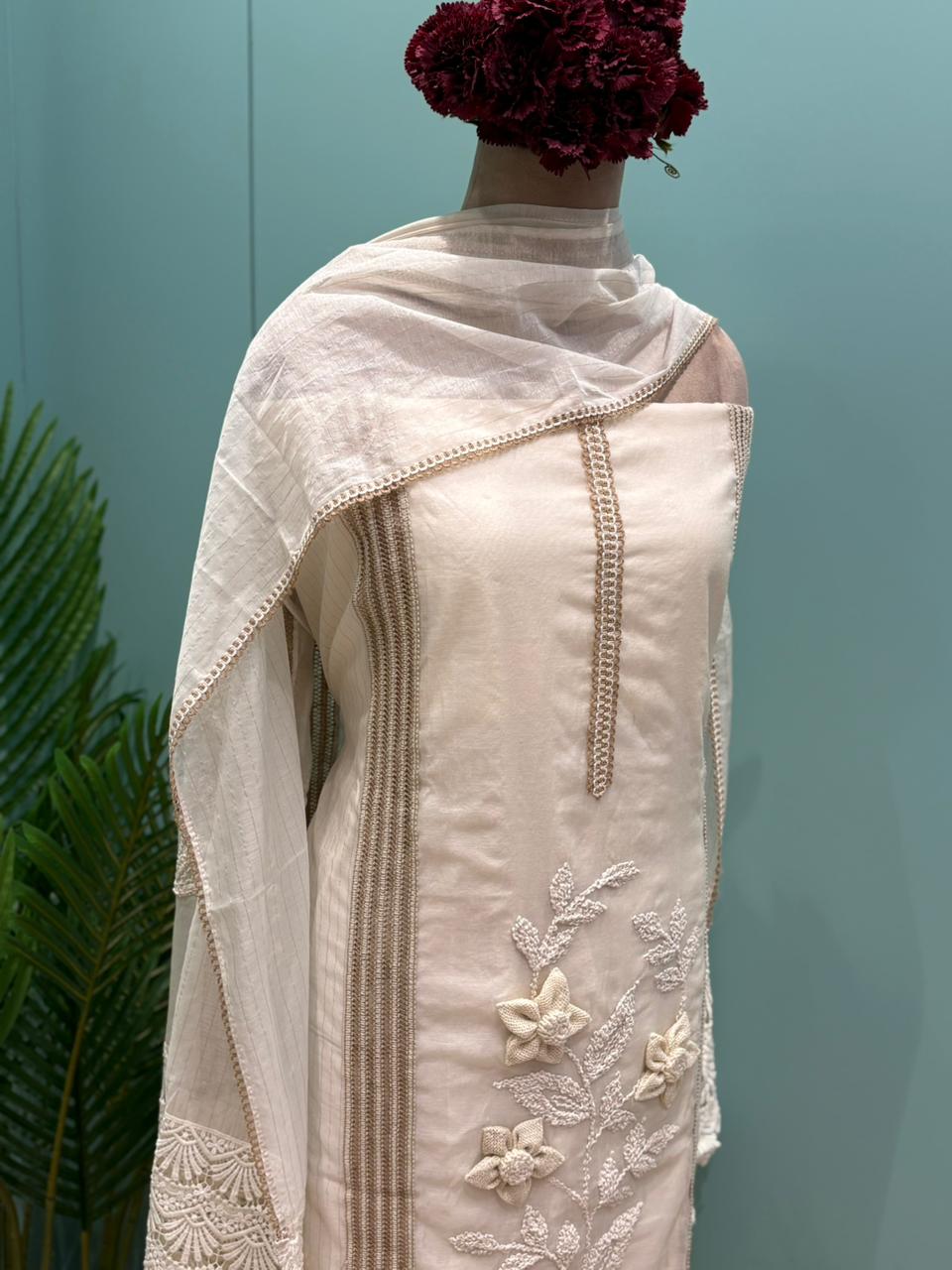 Graceful and timeless, this beautiful unstitched cotton suit