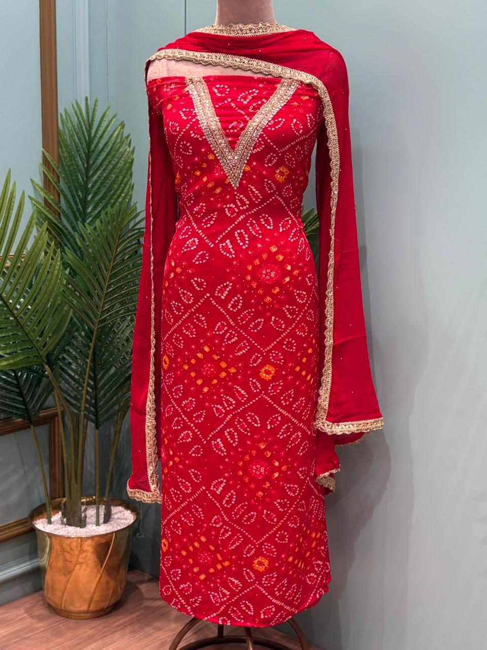 Elegant unstitched suit set is crafted in premium Chinon fabric