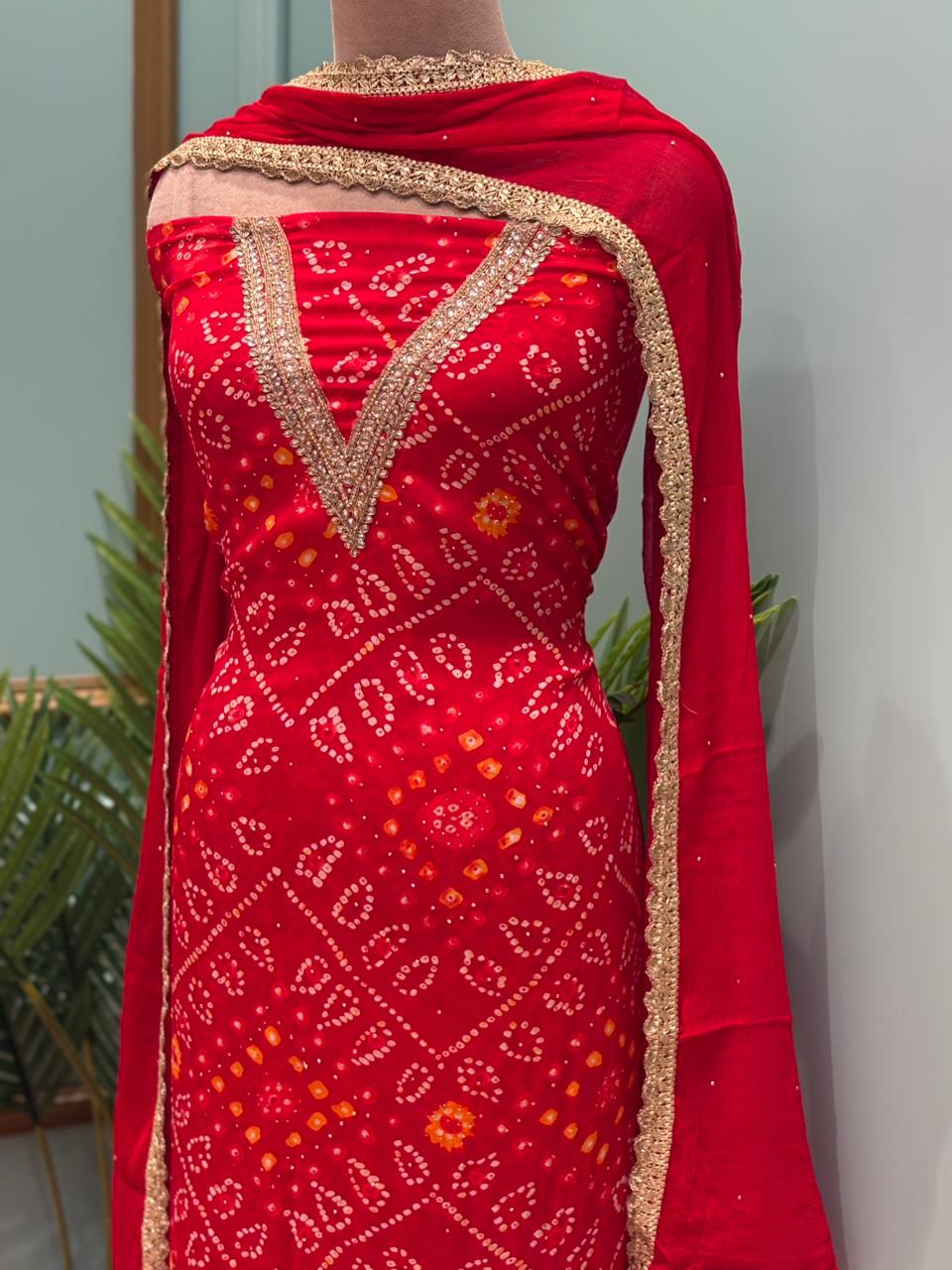 Elegant unstitched suit set is crafted in premium Chinon fabric