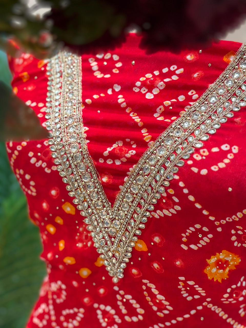 Elegant unstitched suit set is crafted in premium Chinon fabric