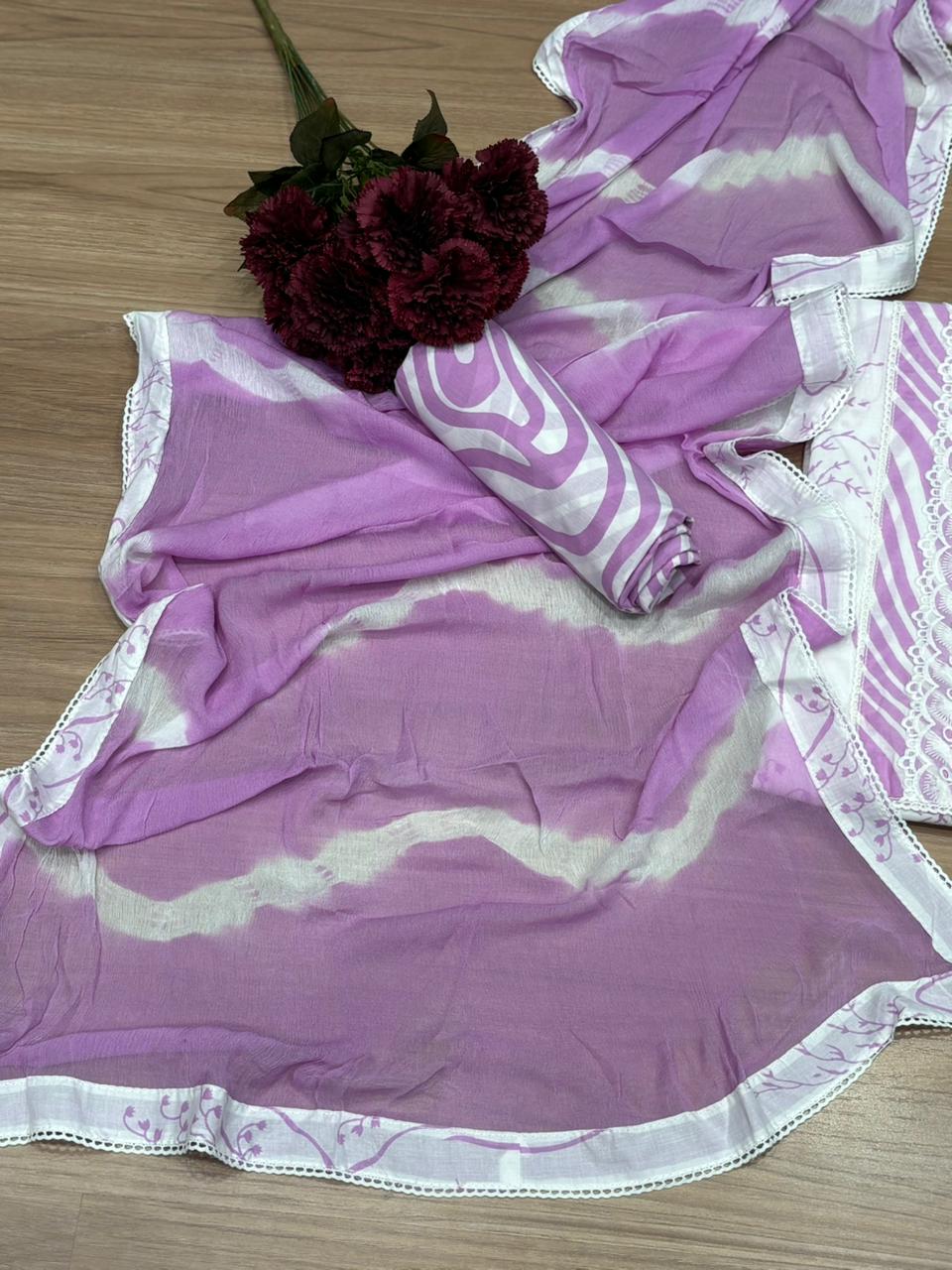 Elegant unstitched suit set is crafted from soft and breathable cotton fabric