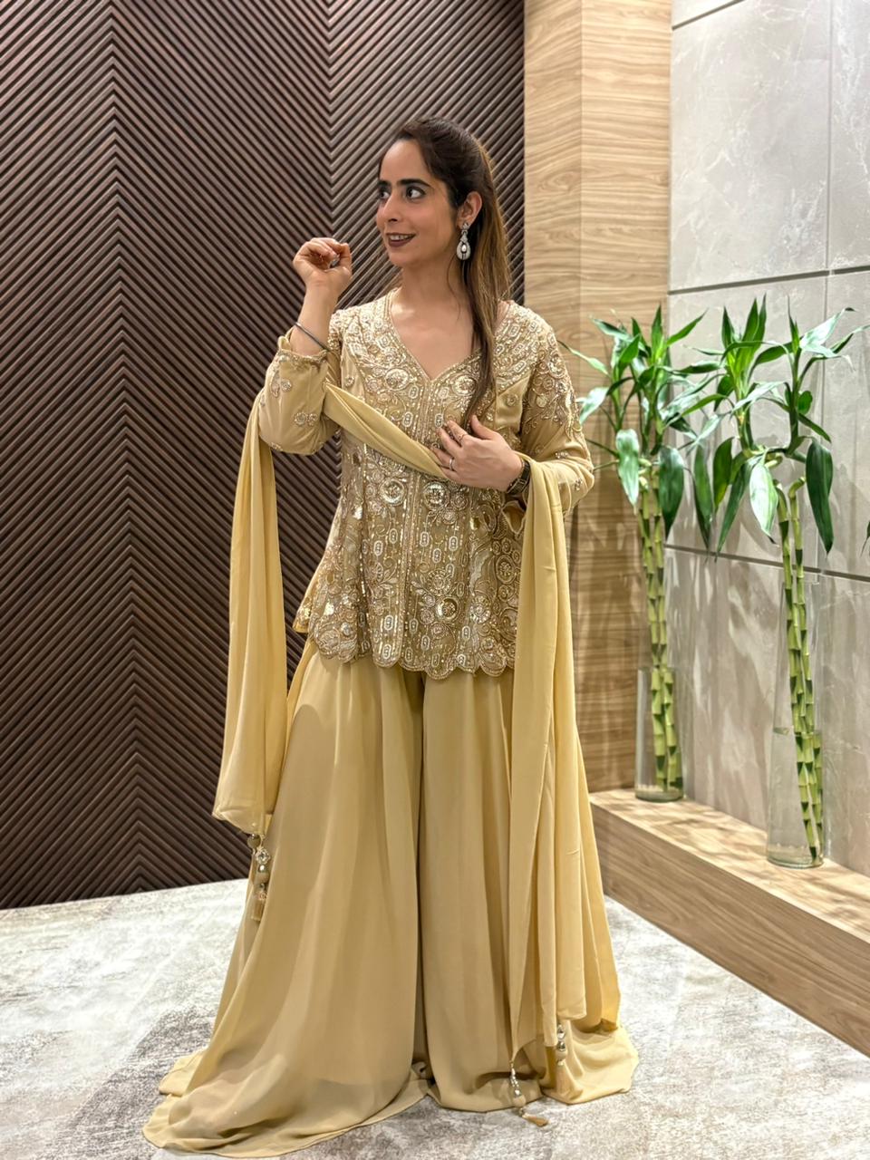 Stunning crop top set paired with a beautifully embroidered jacket.