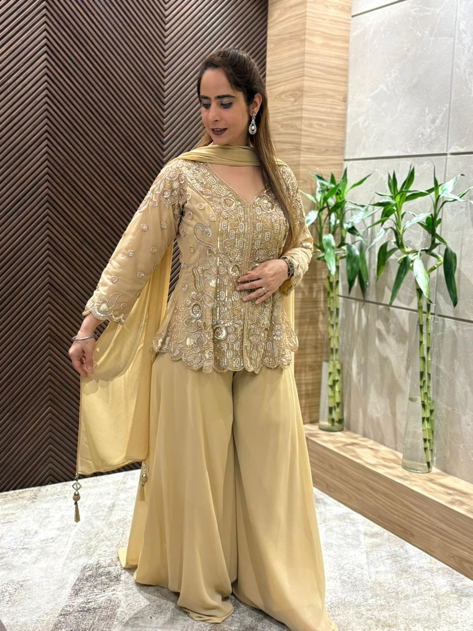 Stunning crop top set paired with a beautifully embroidered jacket.